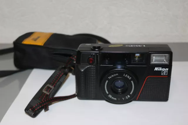 Nikon L35 AF2 fotocamera compatta con custodia