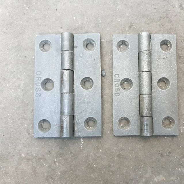Pair of old 3 1/2" Cross hinges cast iron