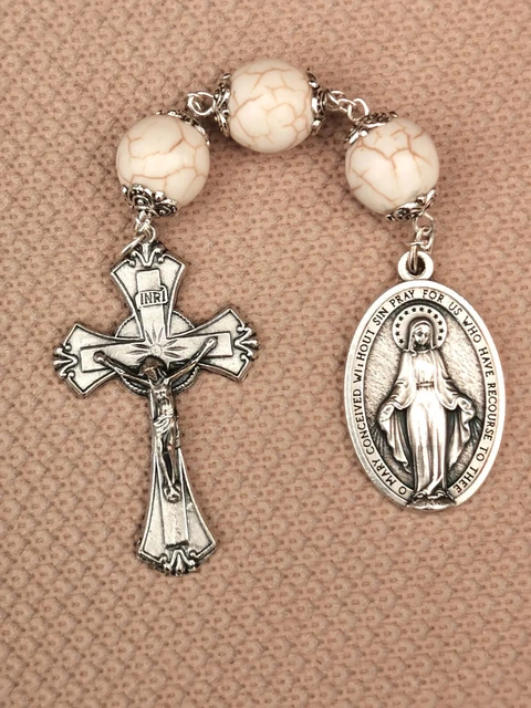 Pocket chaplet with three Hail Mary beads