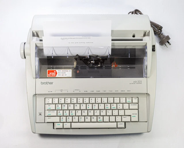 BROTHER AX325 PORTABLE Lightweight Electronic Typewriter Manual