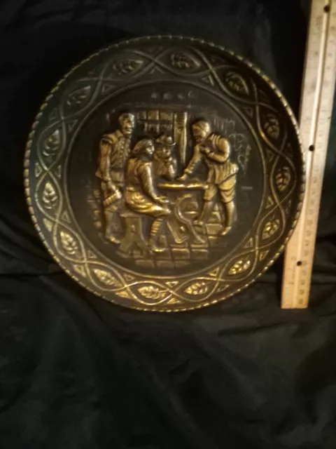 Vintage brass embossed charger flue pipe cover plate repousse metal wall hanging