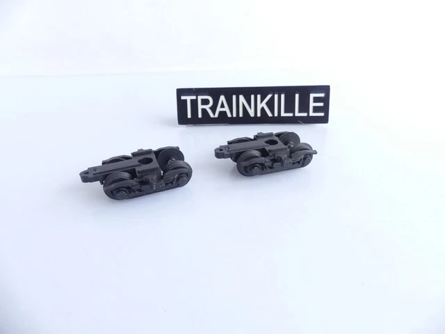 B 114 - LIMA LOT DE 2 BOGIES NOIR + ESSIEUX POUR VOITURE LIMA HO B 114 - LIMA LOT DE 2 BOGIES NOIR + ESSIEUX POUR VOITURE LIMA HO