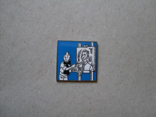 TINTIN - Pin.   Tim an der Staffelei malt Herge. /  blau