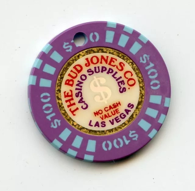 100.00 Chip from the Bud Jones Company Las Vegas Nevada Purple Drilled Sample