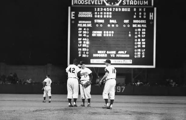 Brooklyn Dodgers Jackie Robinson speaks with Carl Erskine vs Milwa - Old Photo