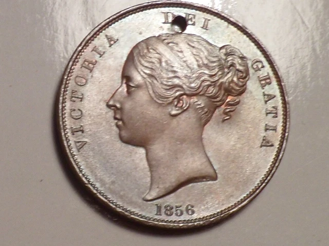 1856 Victoria YH Penny.  P.T. Choice, but pierced. V.Rare as such. British. 1843