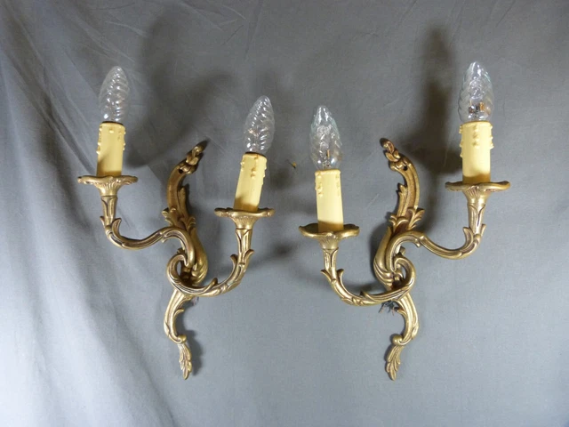 Pair of Rococo style gilt bronze French wall sconces