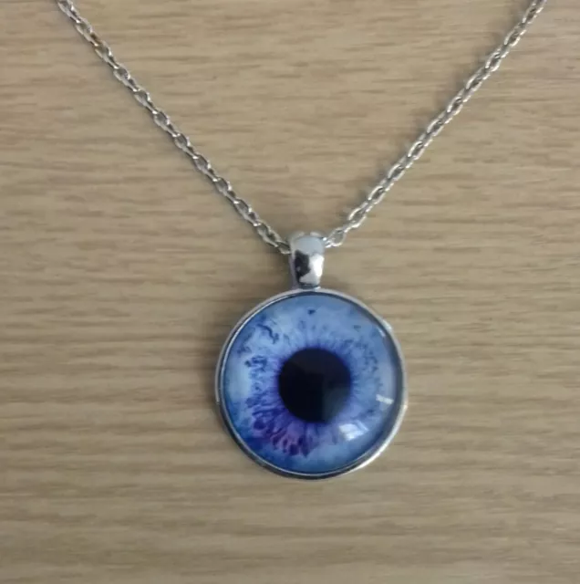 Silver Plated Round Glass Purple/Multi-Coloured Eye Pendant With Purple Pouch