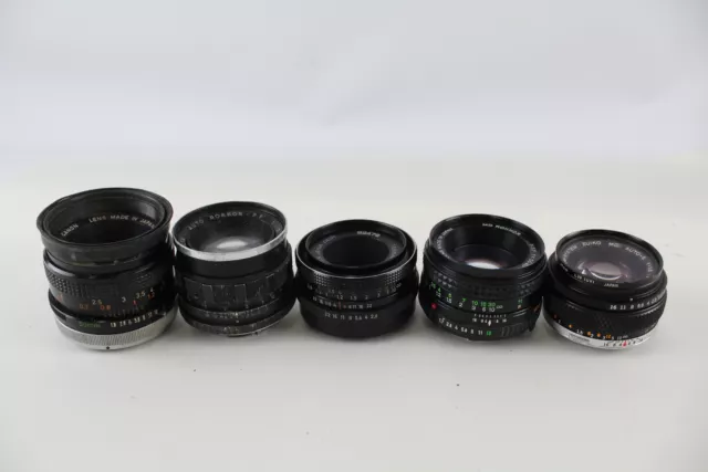 5 x OBIETTIVI FOTOCAMERA Inc. Canon, Carl Zeiss, Minolta & Olympus con alcuni copriobiettivi