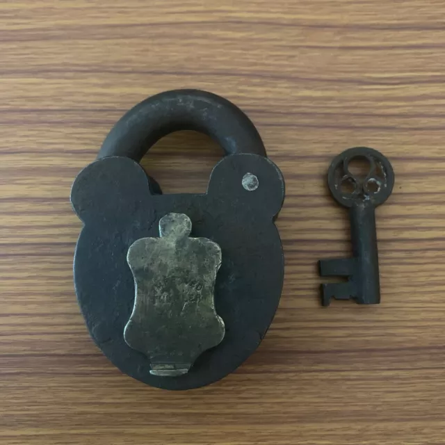 Iron smoke-house padlock or lock with key, old or antique, different key-hole.
