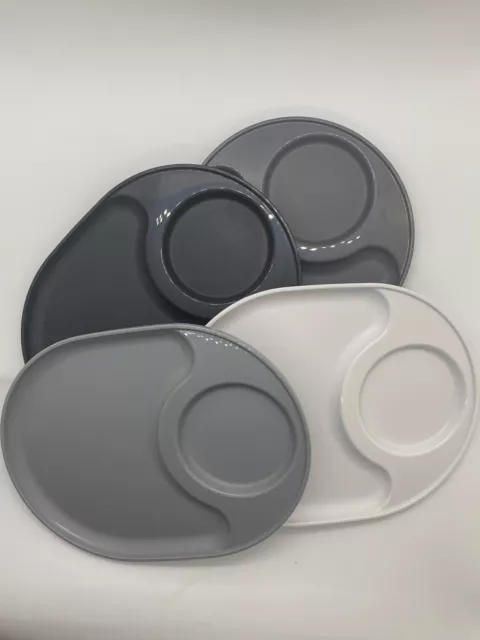 New Tupperware  Snack Plates. Assorted Grey. Set of 4. Grey tone.