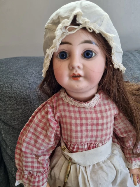 poupée ancienne Unis France 301, tête en biscuit, corps à rotules, yeux