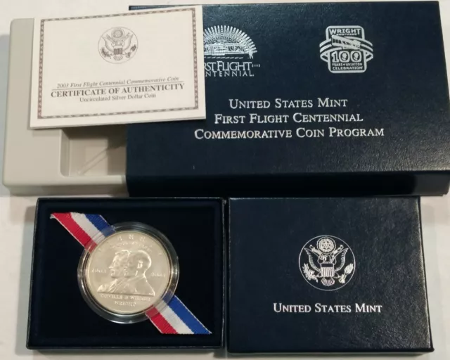 2003 First Flight BU commemorative silver dollar with box & coa. UNC