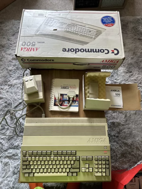 Commodore Amiga A500  with power supply and monitor adapter And Box