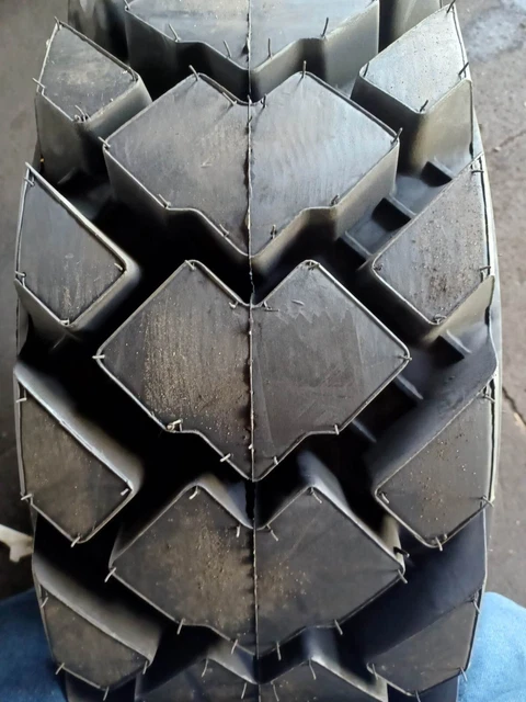 12x16.5 TIRE H/E NEW OVERSTOCKS 14PLY R-4 12165 12 16.5