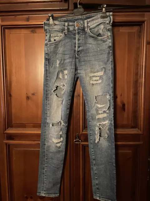 Jeans Strappati