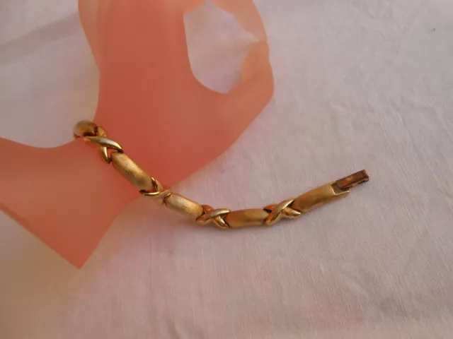 Bracciale firmato NAPIER metallo dorato