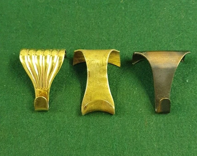 One Arts and Crafts brass picture hook and 2 others
