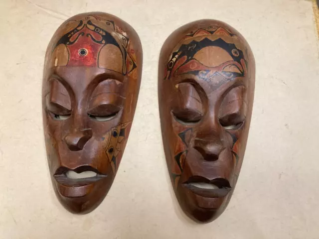 pair of Hand Carved Hand Painted African Masks