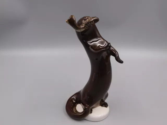 USSR LOMONOSOV PORCELIAN 8 5/8", 22cm OTTER WITH FISH FIGURINE.