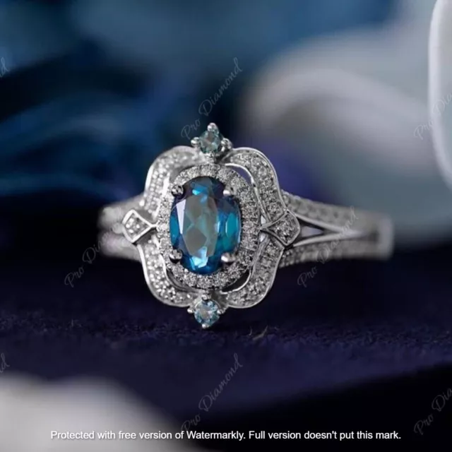 2Ct Ovale Naturel Topaze Bleu Londres Halo Fiançailles Bague 14K or Blanc Argent
