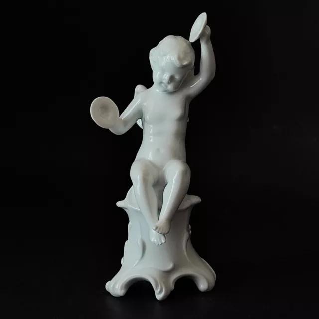 Statuina - Puttino suonatore con cimbali - Ginori - serie Capodimonte (c. 900)