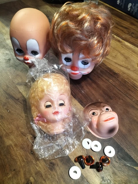 Plastic Clown Dolls Heads And Monkey Mask Unsure Of The Age.