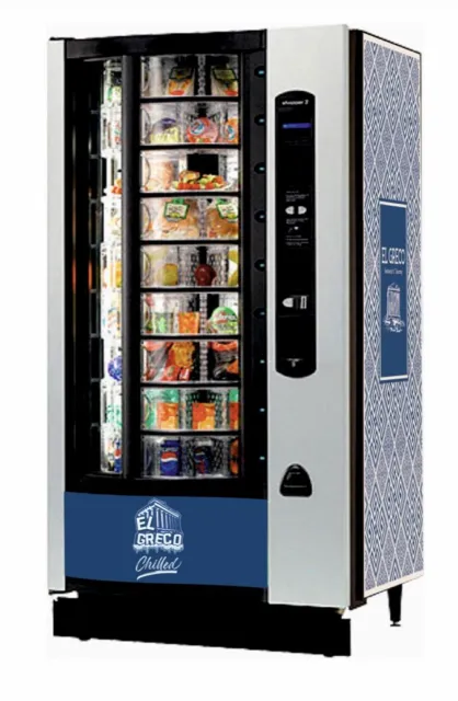 Crane Shopper 2 refrigerated vending machine with Coin Mech payment system.