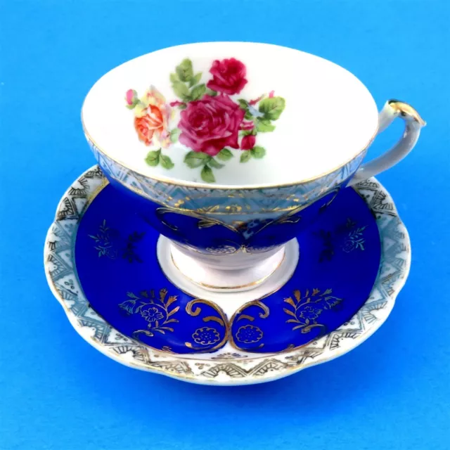 Electric Blue and Gold Exterior with Rose Bouquet Japan Tea Cup and Saucer Set