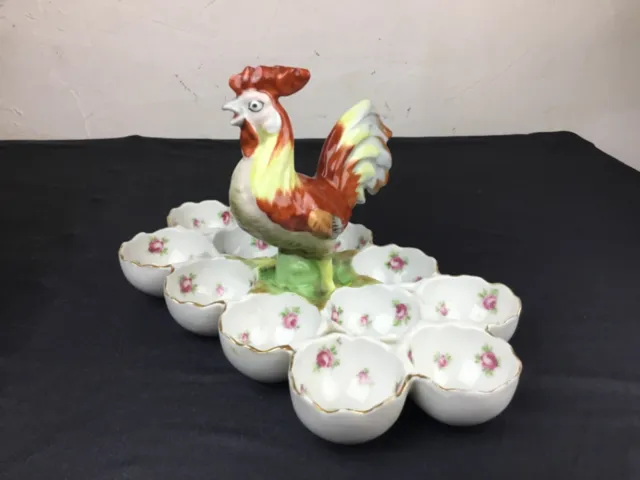 # Présentoir à oeufs en porcelaine , 12 coquetiers avec le COQ qui surveille