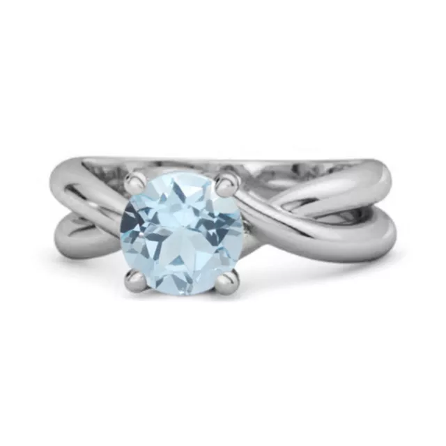 Bague solitaire en or blanc 10 carats avec topaze bleue naturelle de forme...