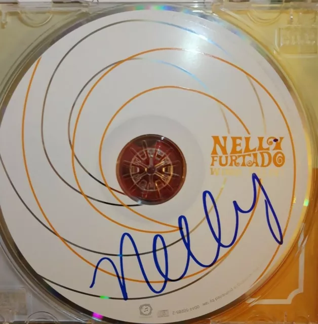 NELLY FURTADO   signed WHOA NELLY cd   2