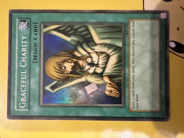 graceful charity yugioh card Amazon.com: Yu-Gi-Oh! - Graceful Charity (SDP-040) - Starter Deck Pegasus -  Unlimited Edition main image 1