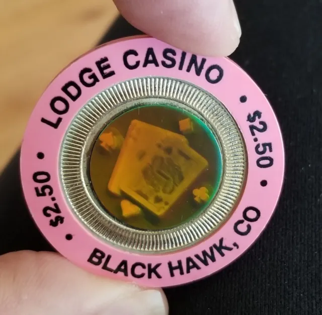 Vintage The LODGE CASINO (Hologram + Brass) *Blackhawk* $2.50 PINK GAMING CHIP