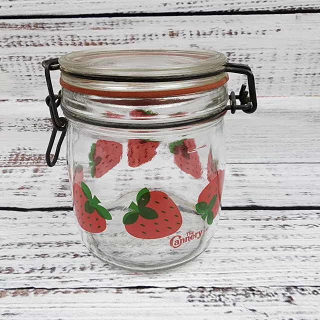 https://www.picclickimg.com/kfAAAOSwVQZkpE-z/Vintage-Glass-Canister-Jar-Strawberries-With-Wire-Clamp.webp