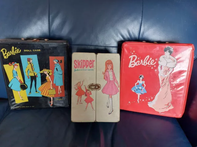 Three Vintage Barbie cases: Red Bubblecut, Black Ponytail, Beige Skipper 1960s