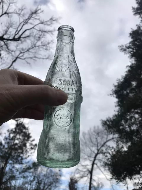 Rare Vintage Embossed Deco Coca-Cola Soda Water Bottle Lexington Mississippi  .
