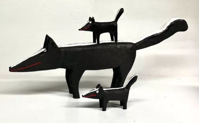 SKUNK FAMILY -  WOOD CARVING by MINNIE ADKINS