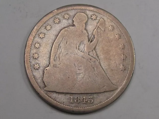 1843 Silver Seated Dollar.  #28