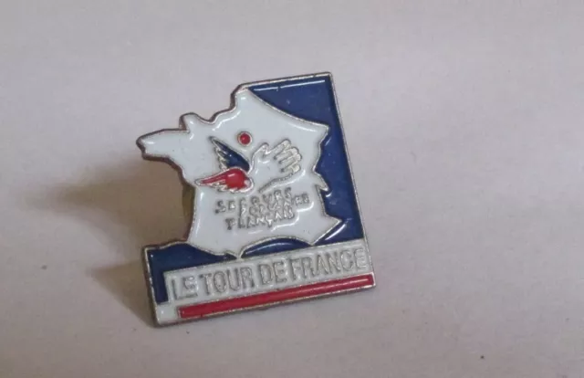 Pin's cyclisme / Tour de France - partenariat avec le secours populaire français