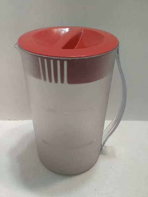 Sold at Auction: large Tupperware pitcher Mr. coffee tea maker