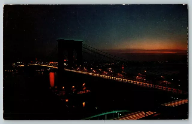 Postcard View of the Brooklyn Bridge at Night in New York City NY