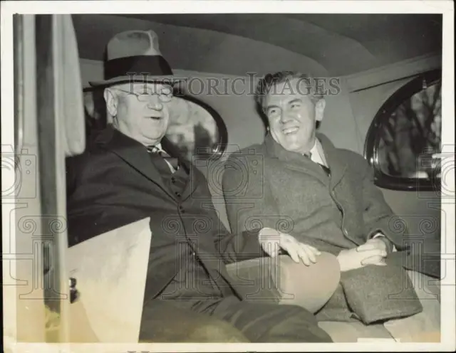1938 Press Photo Secretary of Interior Harold Ickes with Tommy Corcoran in car