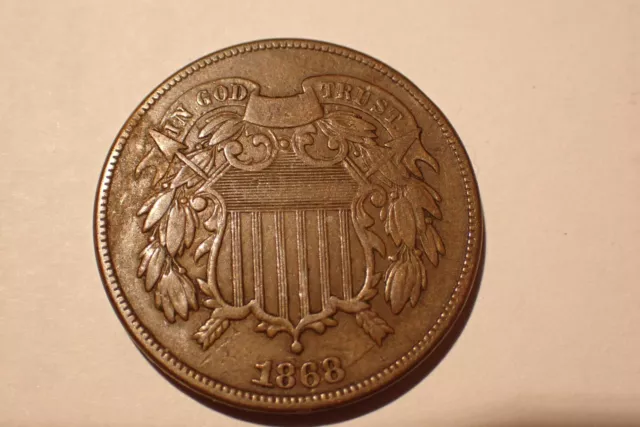 1868 Two Cent Piece VF in my opinion. Die break