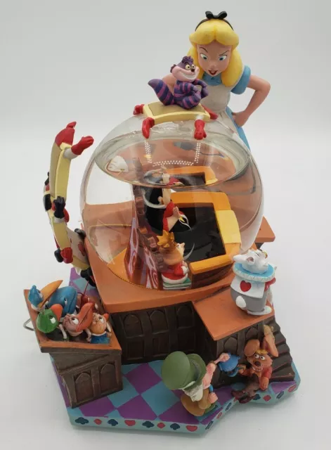 Disney Alice in Wonderland 50th Anniversary Musical Snowglobe- Condition Issues Disney Alice in Wonderland 50th Anniversary Musical Snowglobe- Condition Issues