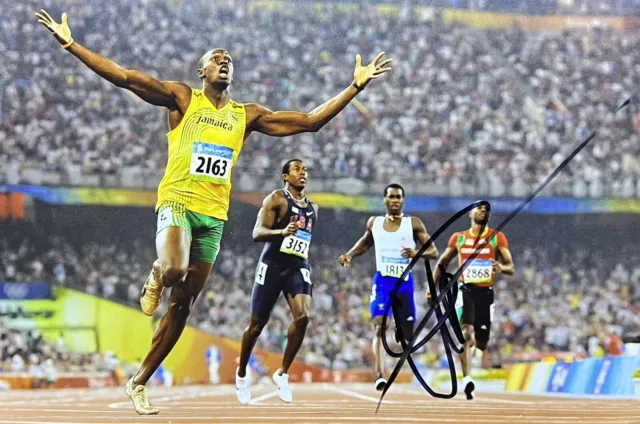 Usain Bolt Signed 12x8 Olympics 100m 200m Photo