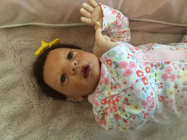 Beautiful Realborn mixed race reborn baby girl doll. Hand rooted hair. 19.5 ins. 3