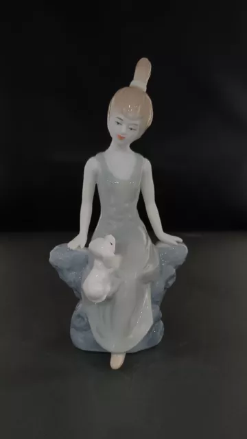 Female Figurine Porcelain Ornament Sitting With Small White Long Eared Dog.