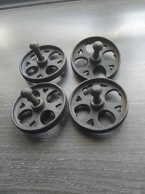 Four Small Vintage  Metal Wheels