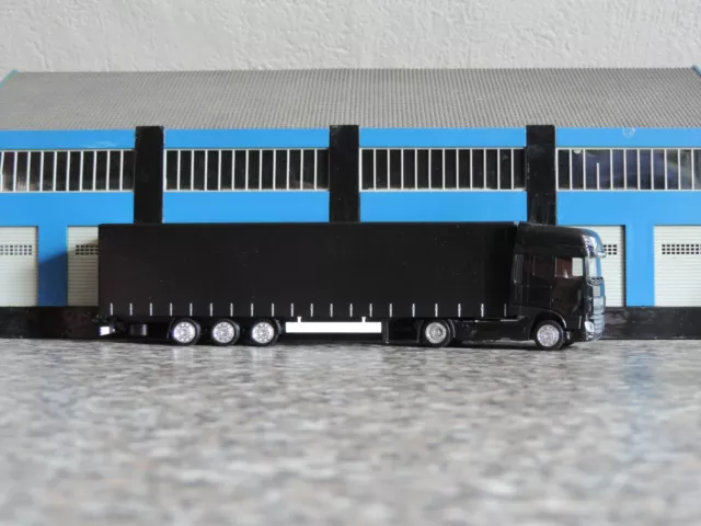 Herpa 1:87 - 731130 - DAF XF 107 SSC 5-achs Volumenplanensattelzug - "schwarz"